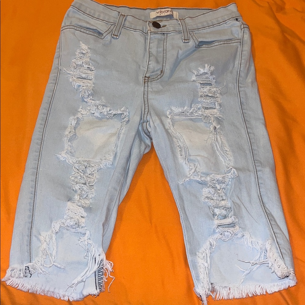 Vibrant Women's Sky Blue Ripped Cropped Jeans